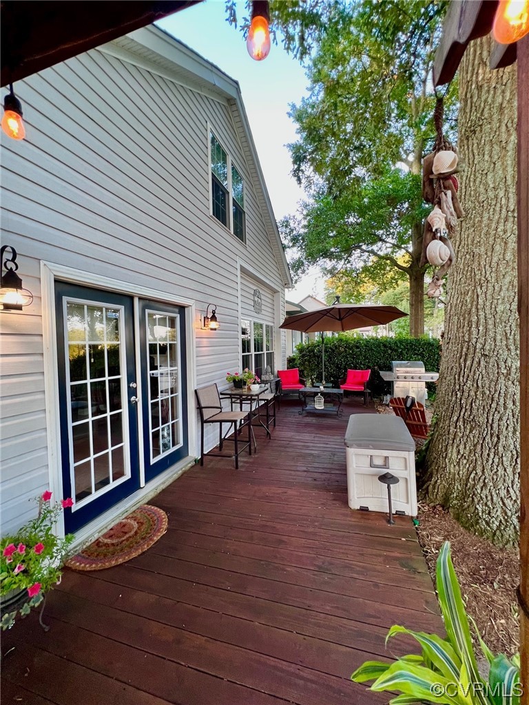 142 Circle Drive Deltaville, VA 23043 - Photo 7 of 49 a view of a house with a patio