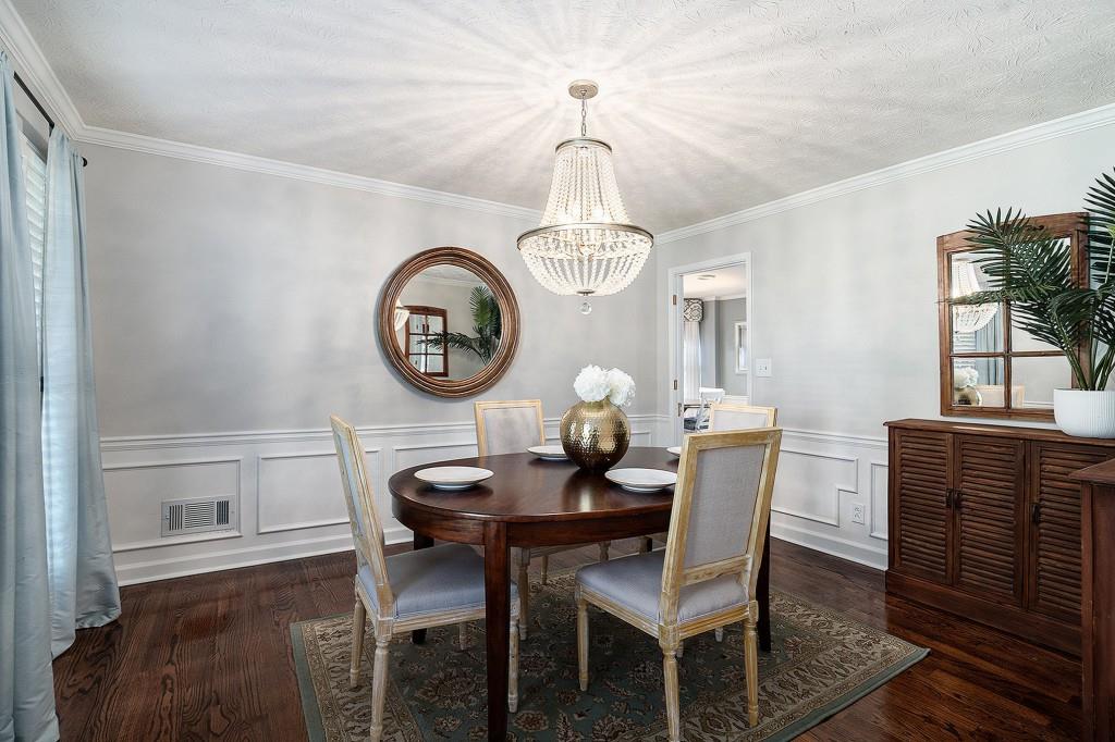 4682 Bentley Place Peachtree Corners, GA 30096 - Photo 13 of 44 a view of a dining room with furniture window and wooden floor