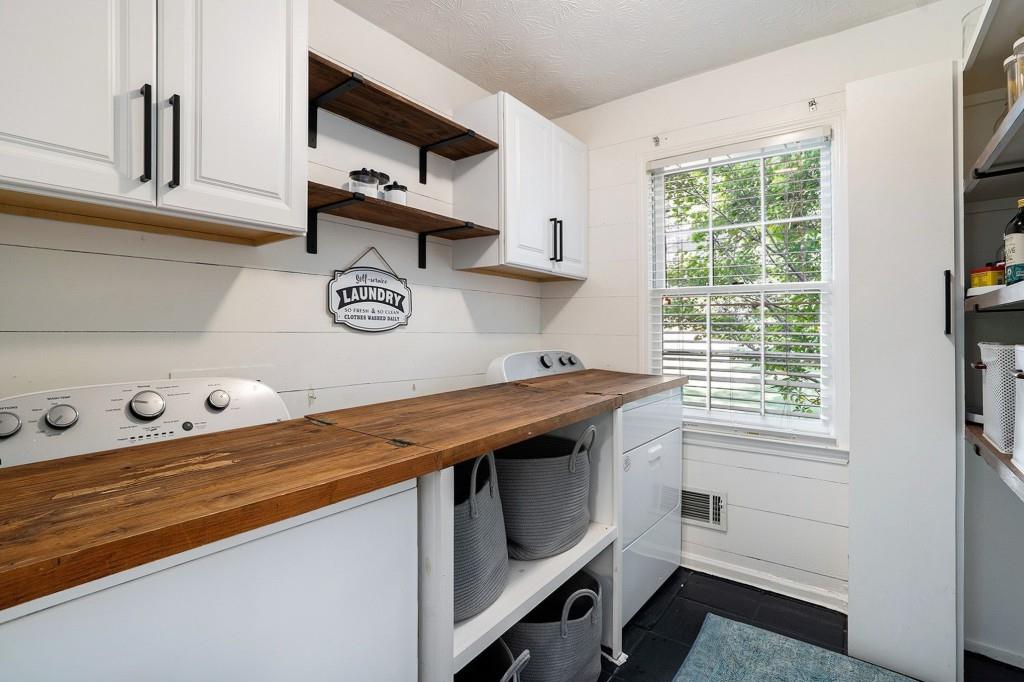 4682 Bentley Place Peachtree Corners, GA 30096 - Photo 23 of 44 a room with storage and utility