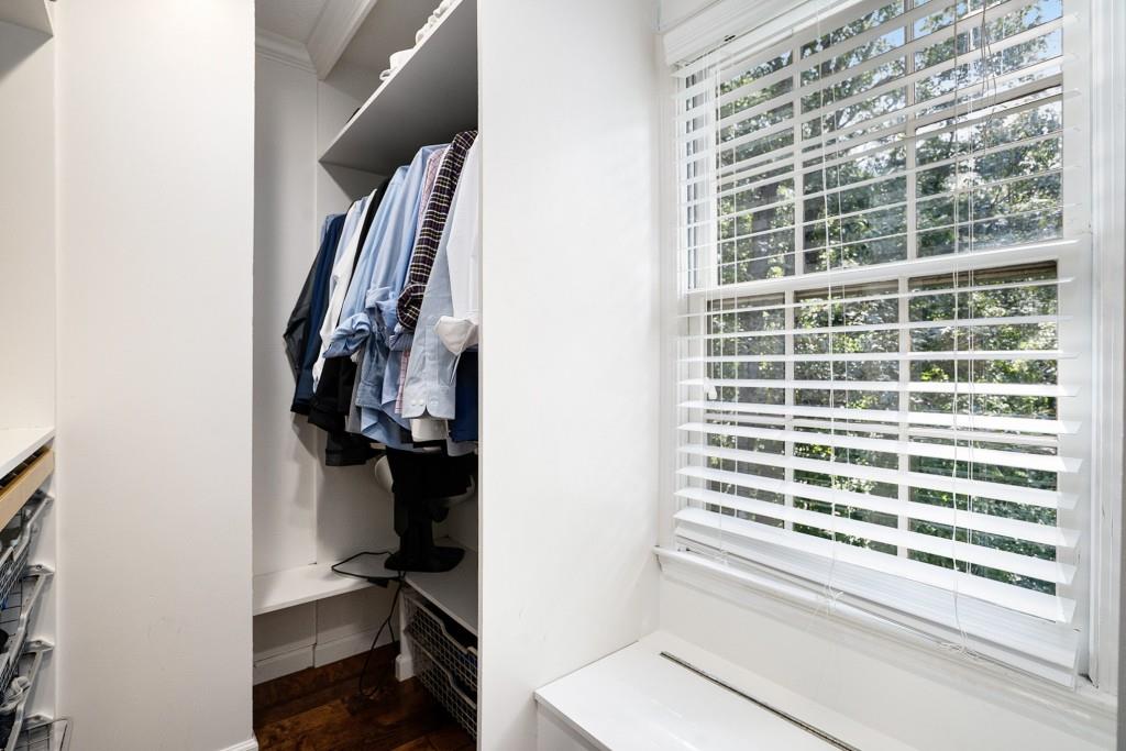 4682 Bentley Place Peachtree Corners, GA 30096 - Photo 26 of 44 a view of walk in closet with clothes and shoes