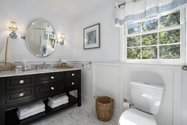 a bathroom with a shower and a toilet