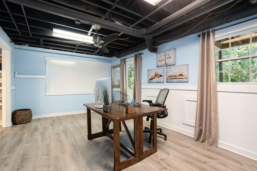 4682 Bentley Place Peachtree Corners, GA 30096 - Photo 39 of 44 a workspace with furniture window and wooden floor