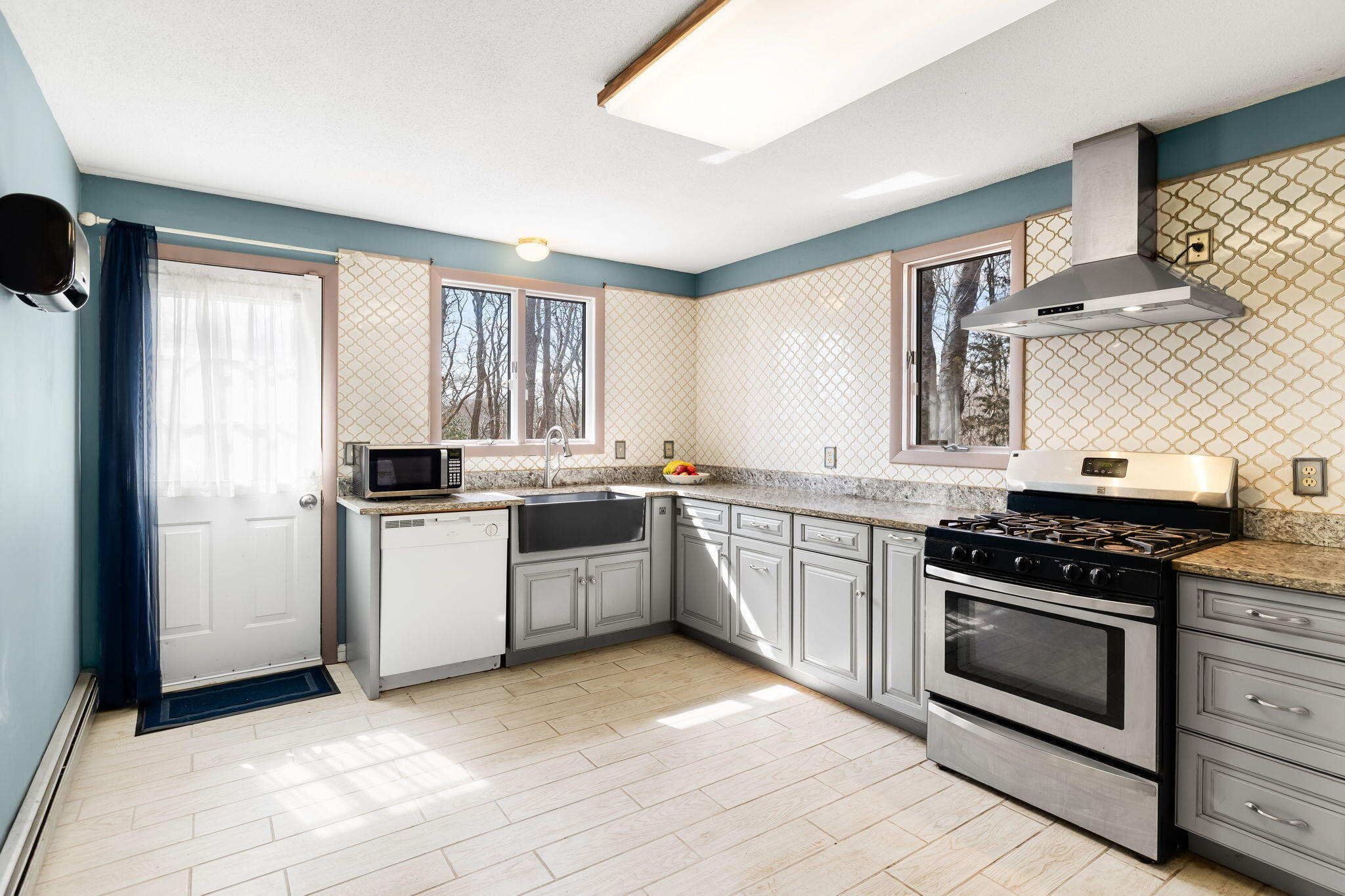 21 Braeside Road Falmouth, MA 02540 - Photo 11 of 43 a kitchen with a stove oven and sink