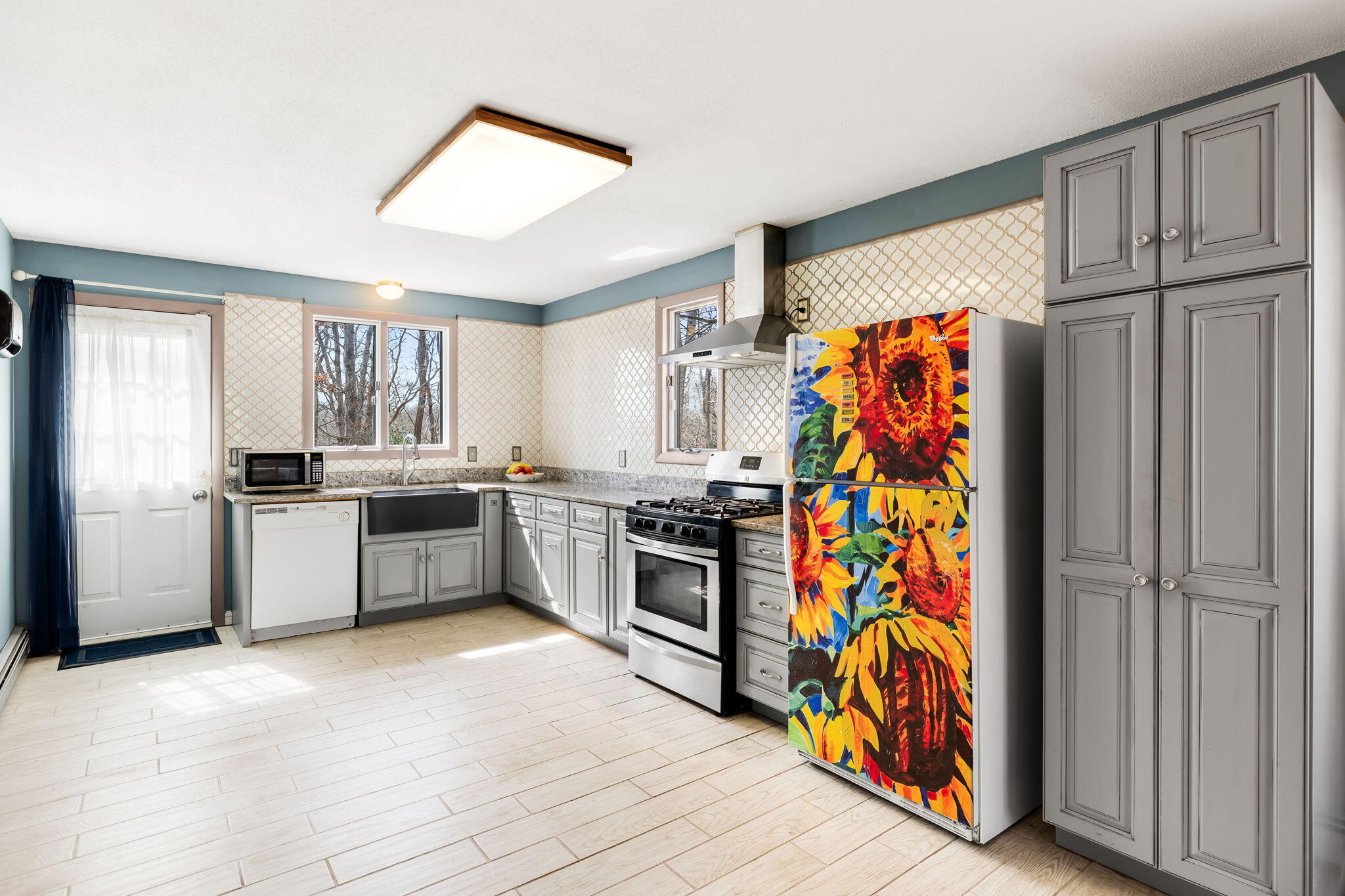 21 Braeside Road Falmouth, MA 02540 - Photo 13 of 43 a kitchen with stainless steel appliances granite countertop a refrigerator and a sink