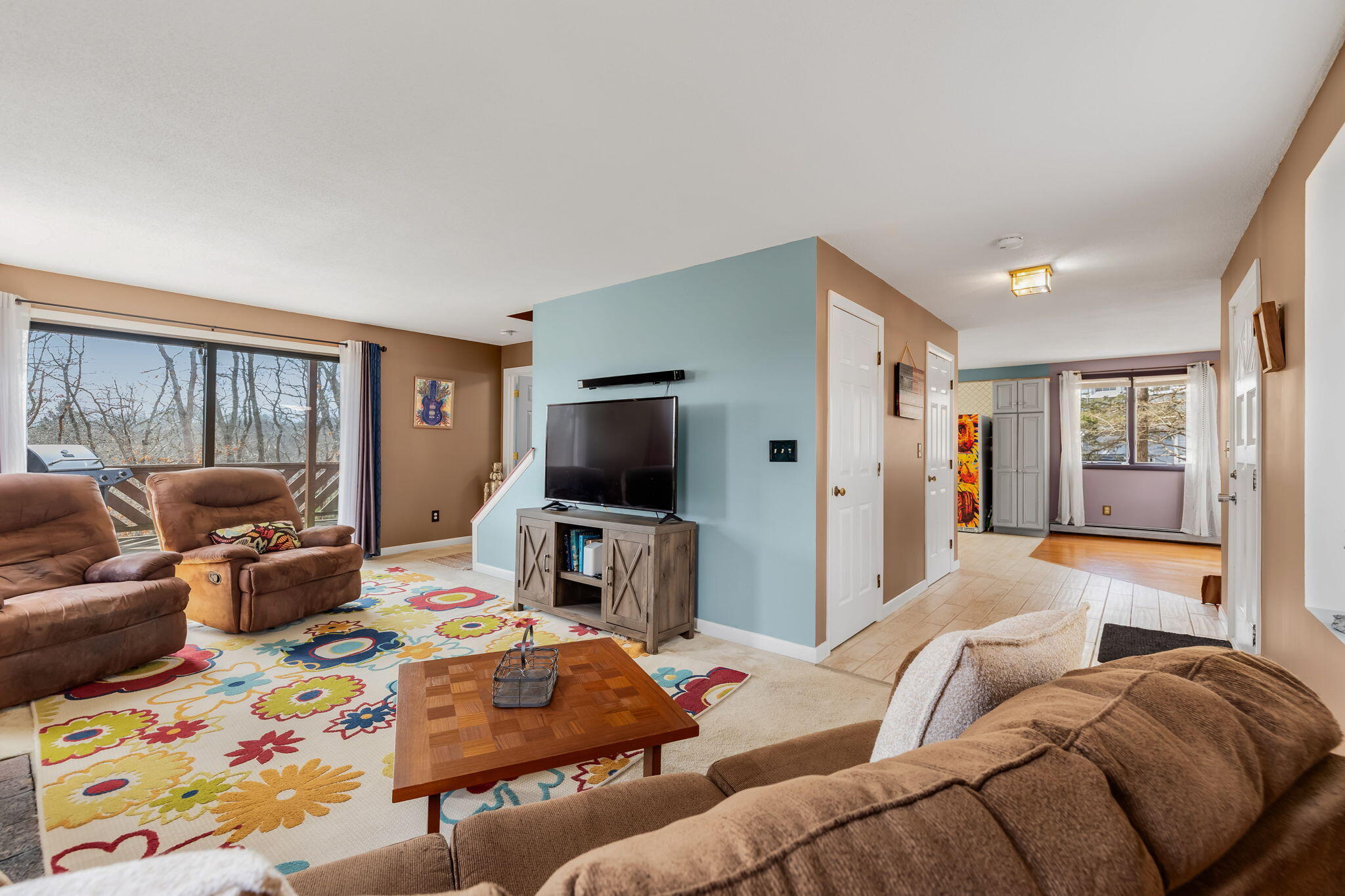 21 Braeside Road Falmouth, MA 02540 - Photo 16 of 43 a living room with furniture and a flat screen tv