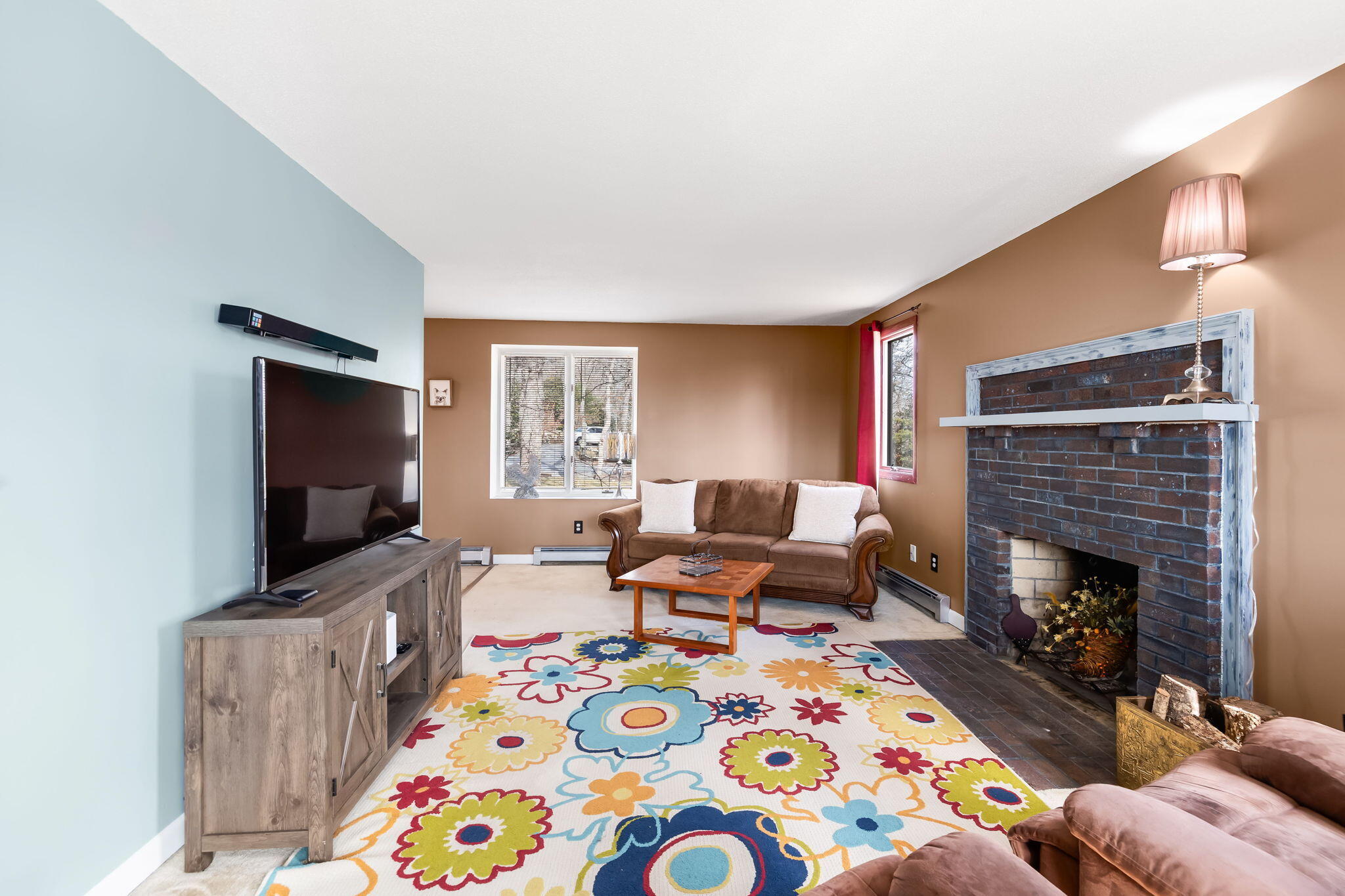 21 Braeside Road Falmouth, MA 02540 - Photo 19 of 43 a living room with furniture and a flat screen tv