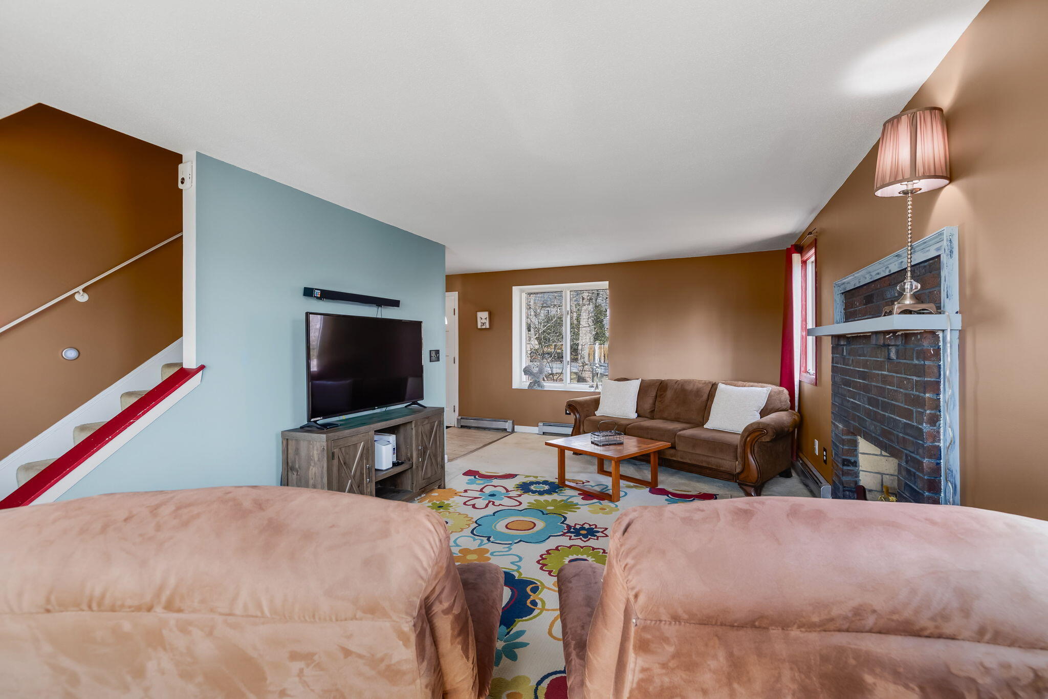21 Braeside Road Falmouth, MA 02540 - Photo 20 of 43 a bedroom with a bed and a flat screen tv