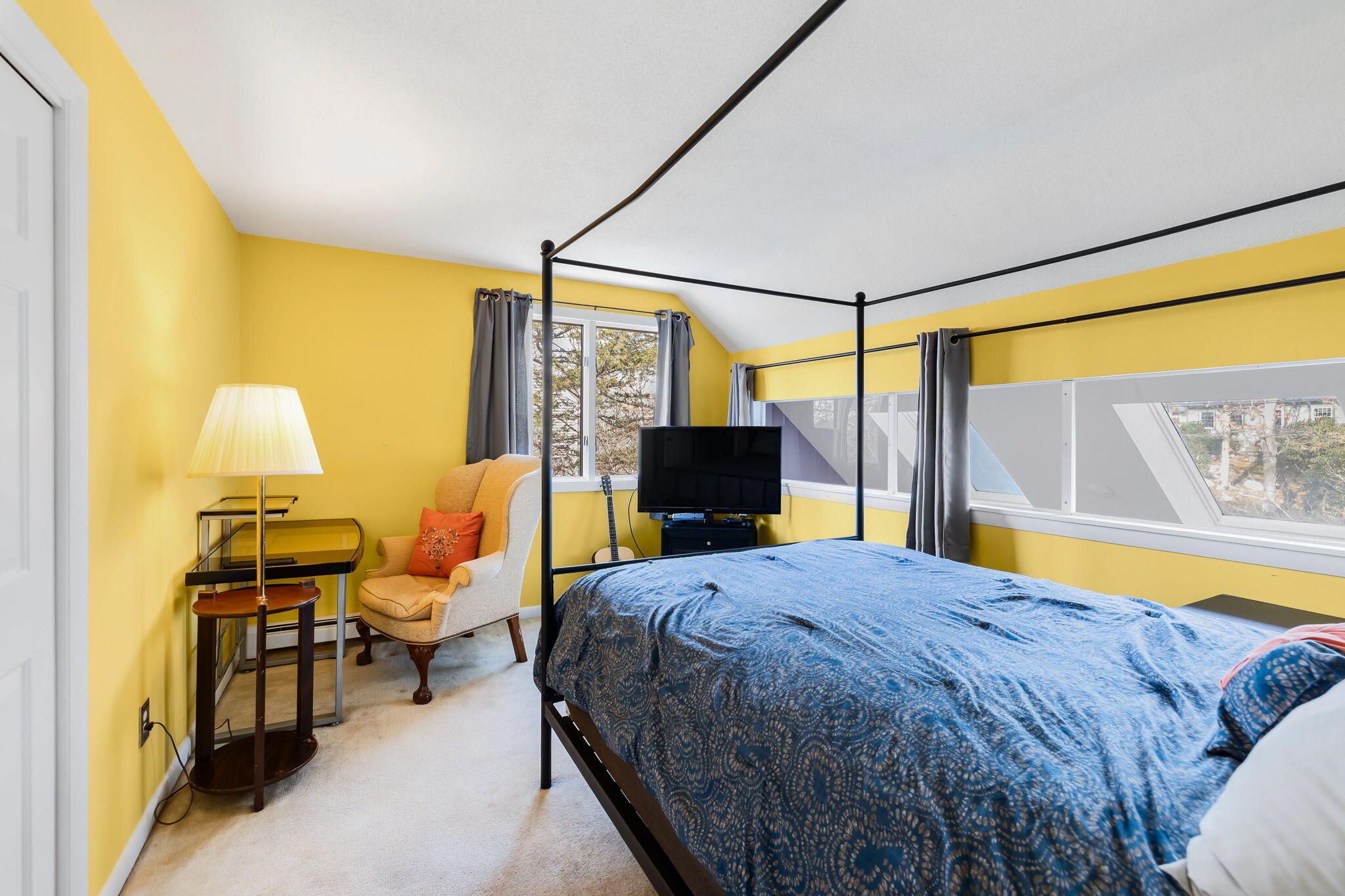 21 Braeside Road Falmouth, MA 02540 - Photo 23 of 43 a bedroom with a bed and wooden floor