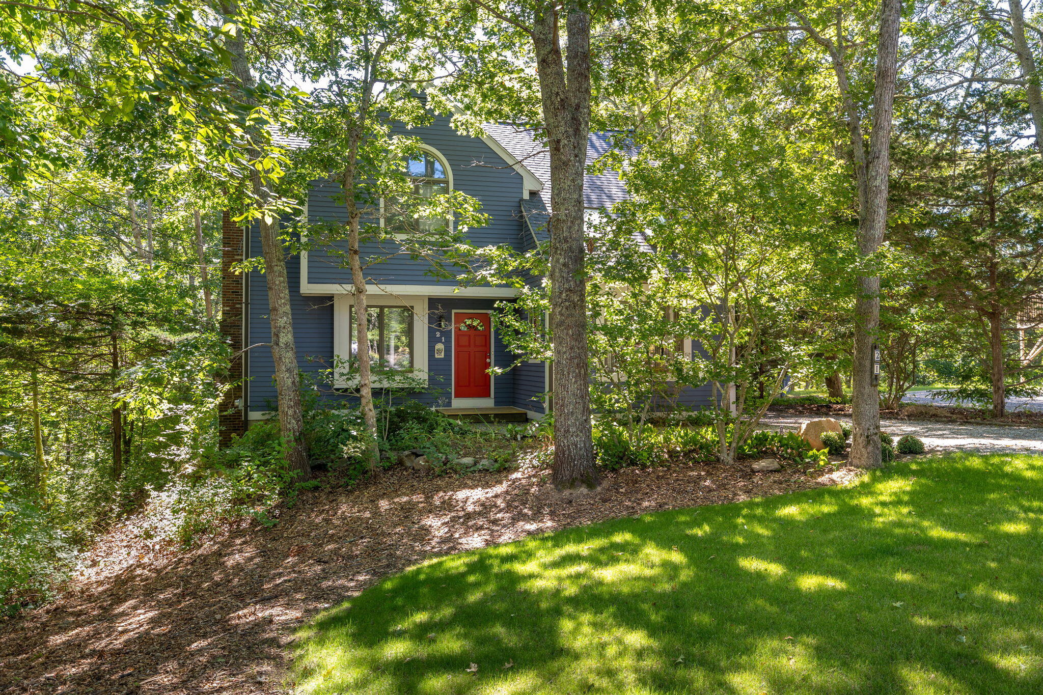 21 Braeside Road Falmouth, MA 02540 - Photo 3 of 43 a view of a big yard with plants and large trees