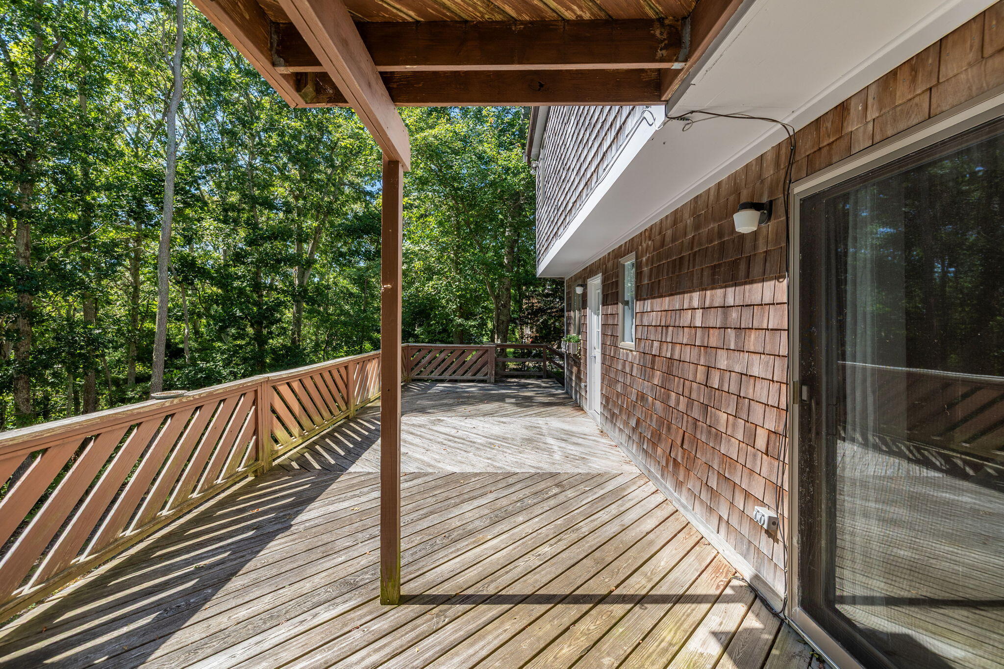 21 Braeside Road Falmouth, MA 02540 - Photo 33 of 43 a view of balcony with wooden floor and fence