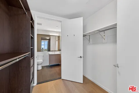 a view of bathroom with a tub and shower