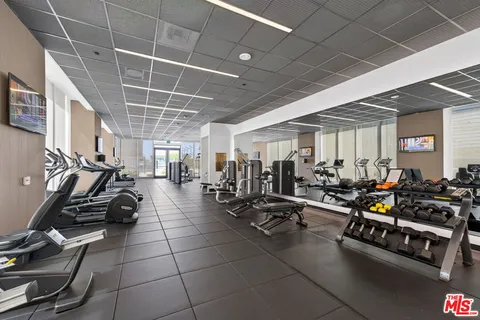 a view of a room with gym equipment