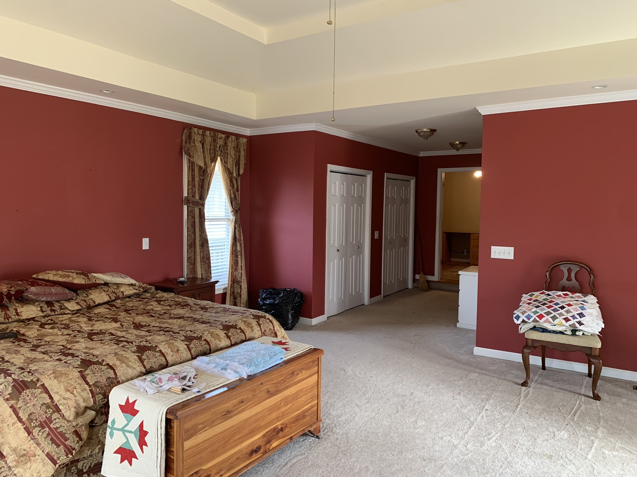 454 Canoe Branch Road Castalian Springs, TN 37031 - Photo 12 of 40 a bedroom with a bed and a chair