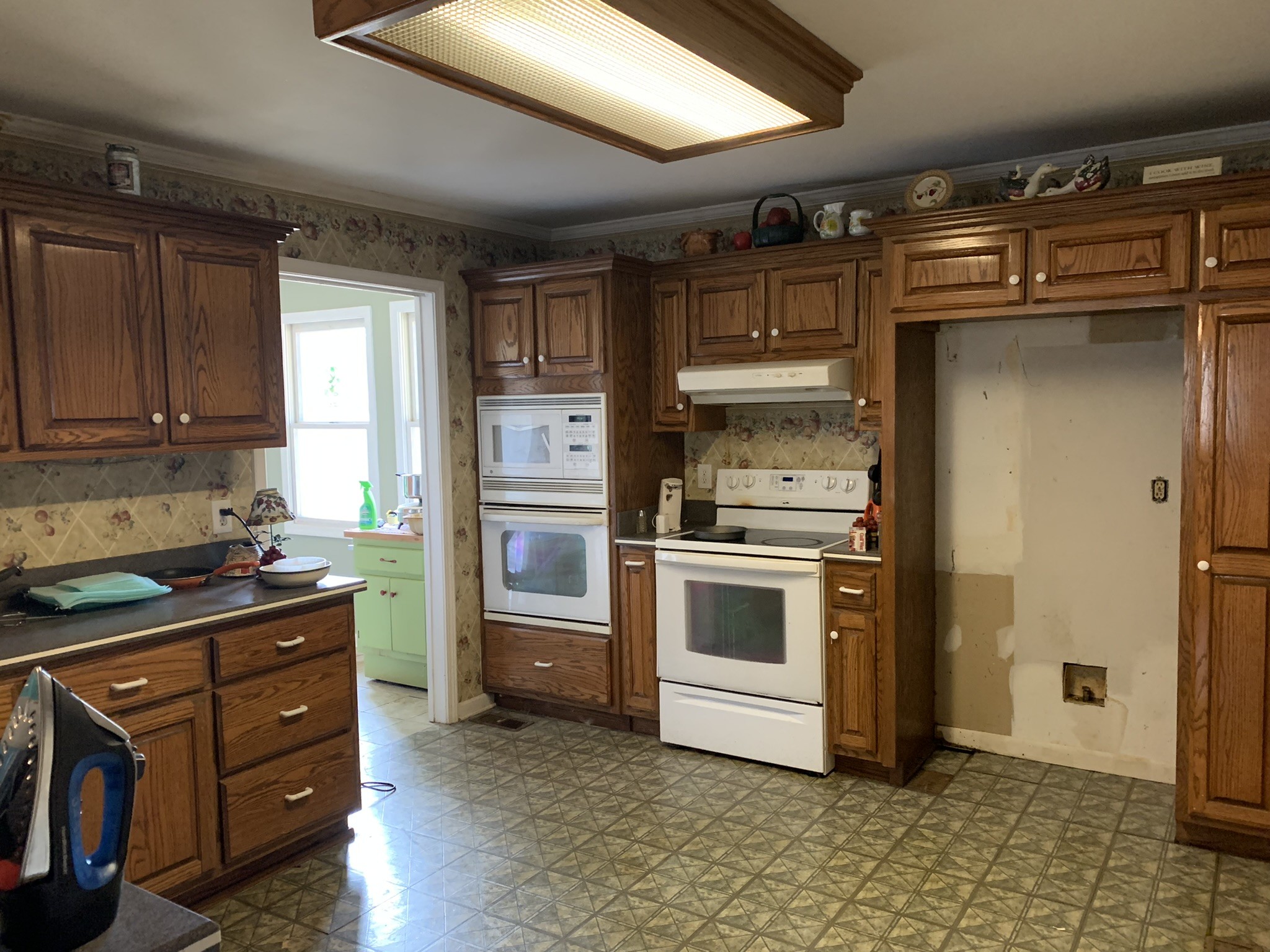 454 Canoe Branch Road Castalian Springs, TN 37031 - Photo 18 of 40 a kitchen with stainless steel appliances granite countertop a refrigerator and a stove