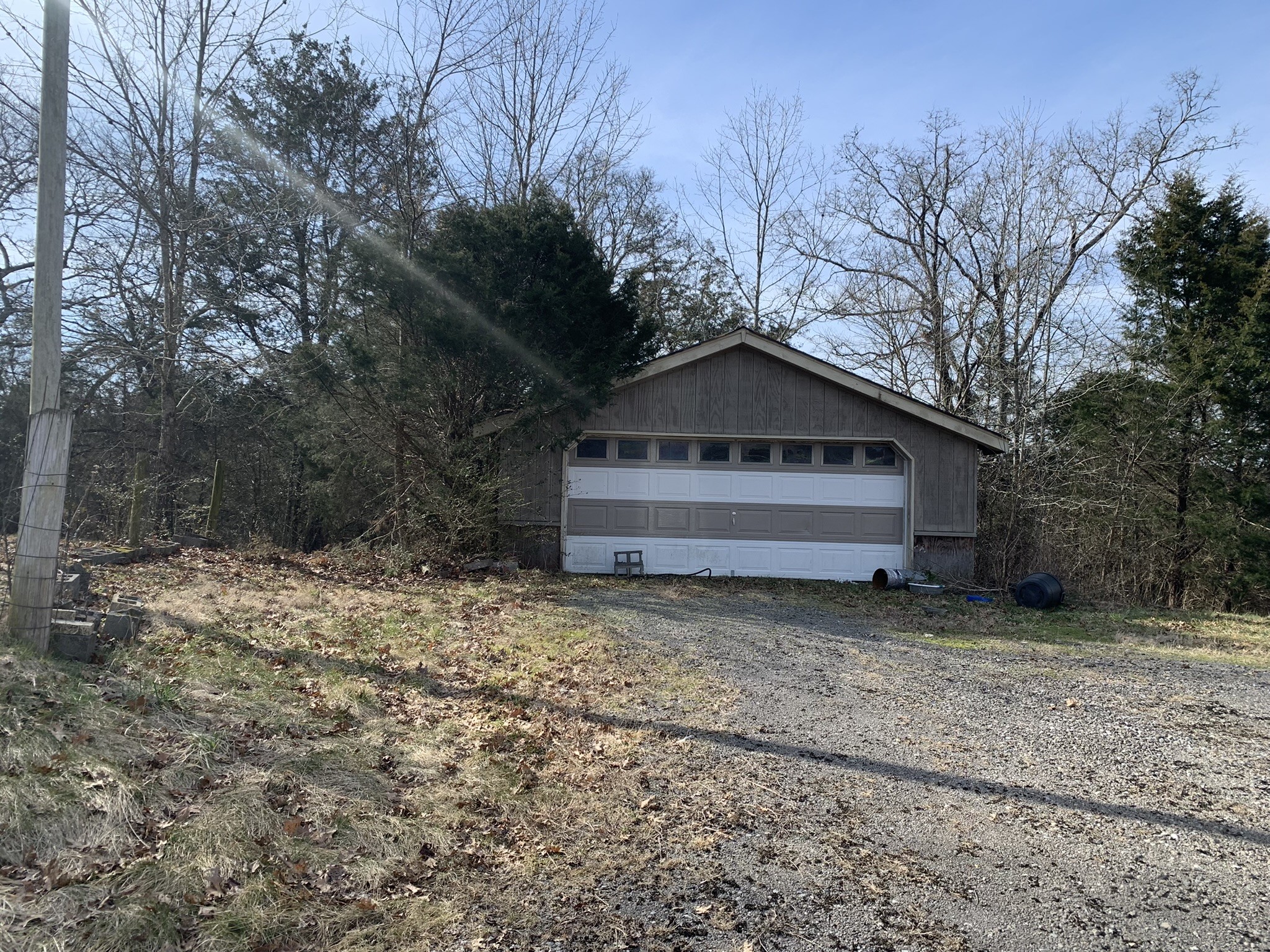 454 Canoe Branch Road Castalian Springs, TN 37031 - Photo 32 of 40 a house with trees in the background
