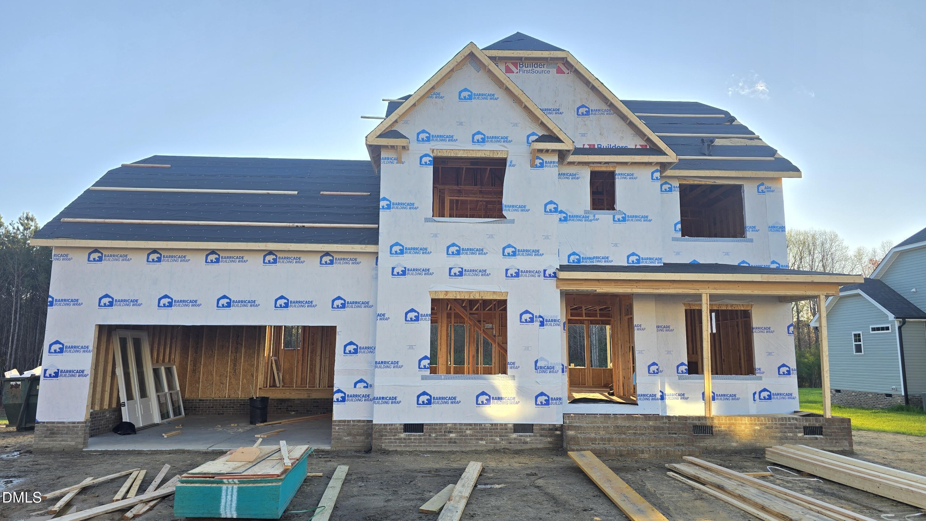 310 Freedom Ridge Drive Smithfield, NC 27577 - Photo 1 of 1 a front view of a house with garden