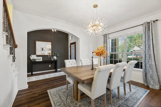 a room with a mirror and a wooden floor