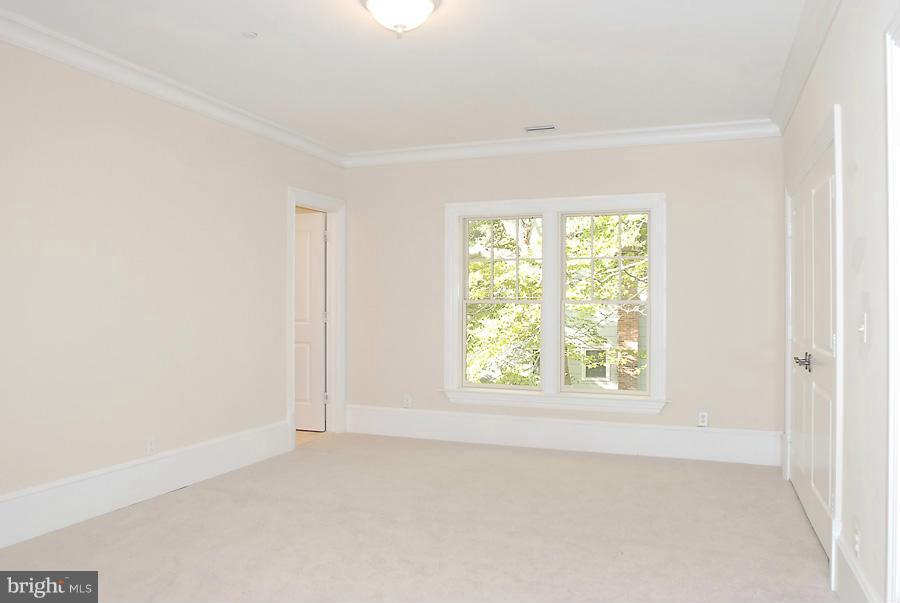 8539 Howell Road Bethesda, MD 20817 - Photo 15 of 22 an empty room with windows