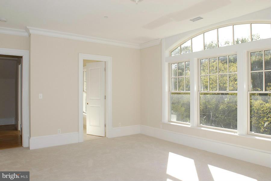 8539 Howell Road Bethesda, MD 20817 - Photo 20 of 22 an empty room with windows