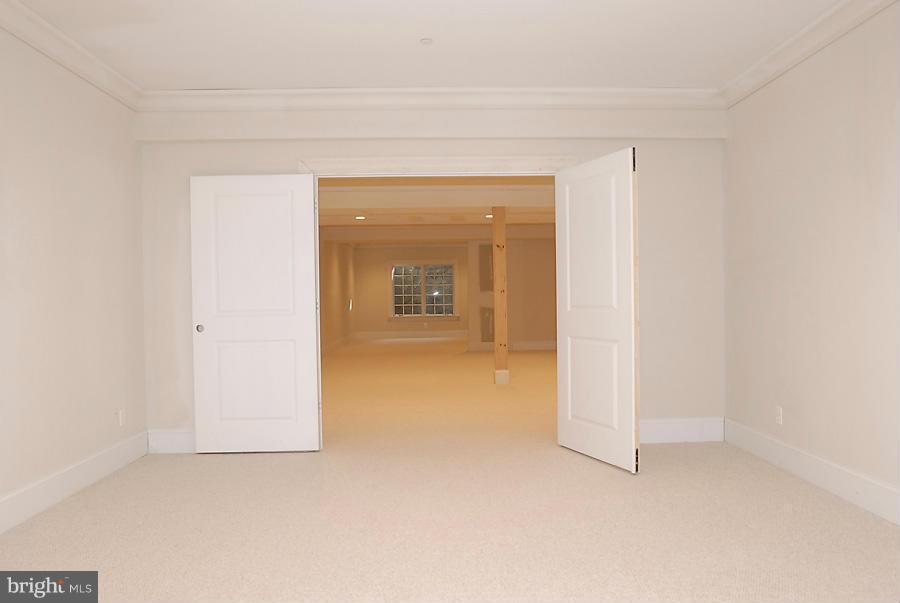 8539 Howell Road Bethesda, MD 20817 - Photo 21 of 22 a view of a room with a hallway