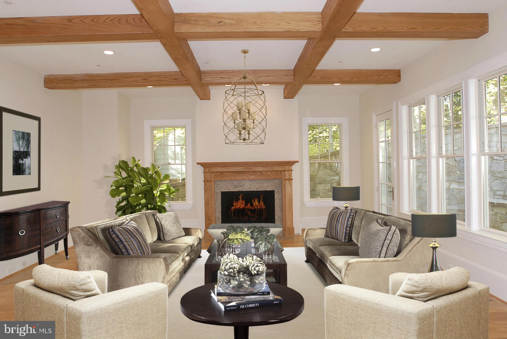 8539 Howell Road Bethesda, MD 20817 - Photo 5 of 22 a living room with furniture and a fireplace