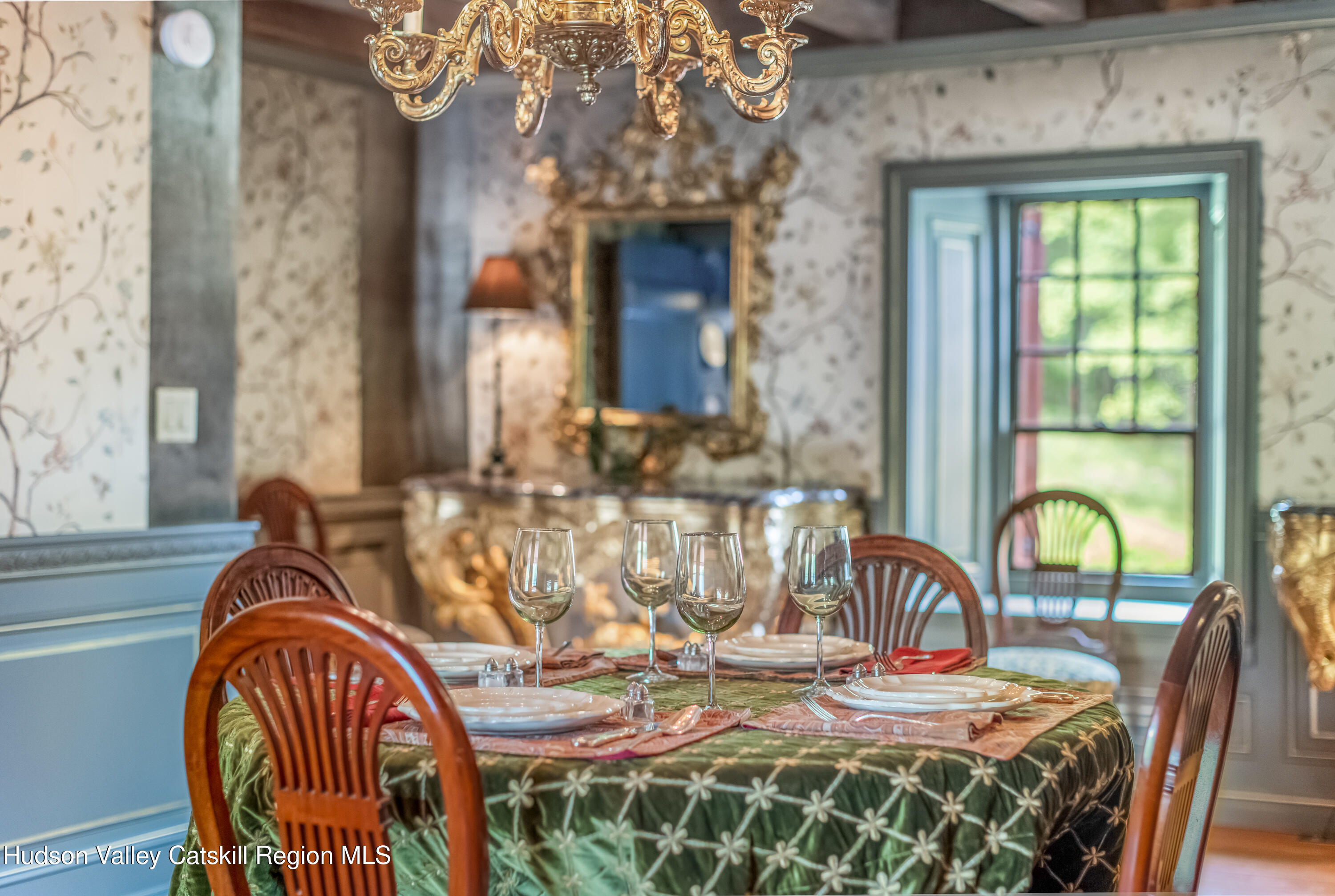 1282 Old Post Road New Paltz, NY 12561 - Photo 13 of 49 a view of a dining room with furniture and chandelier