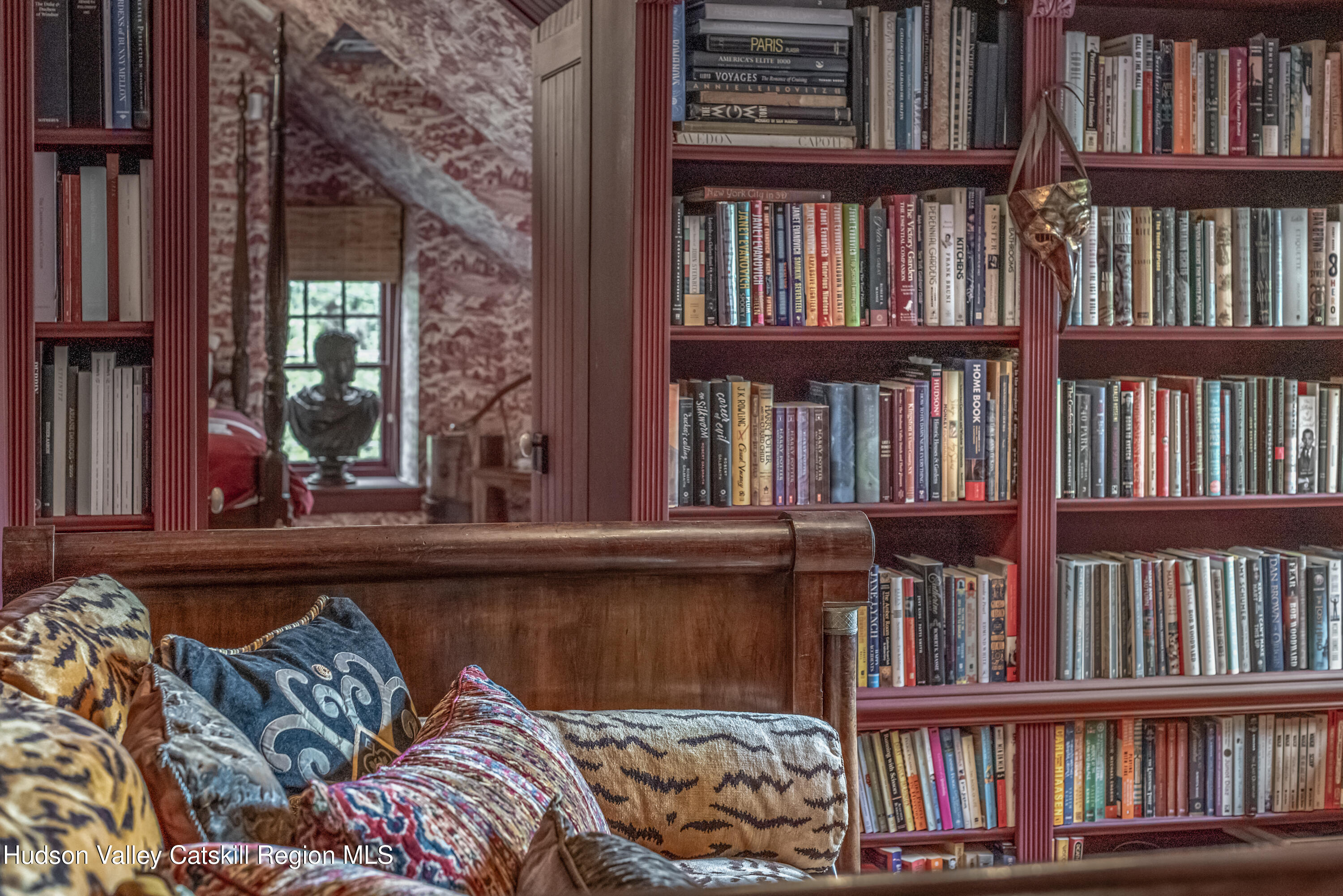 1282 Old Post Road New Paltz, NY 12561 - Photo 35 of 49 a bedroom with a bed and a book shelf