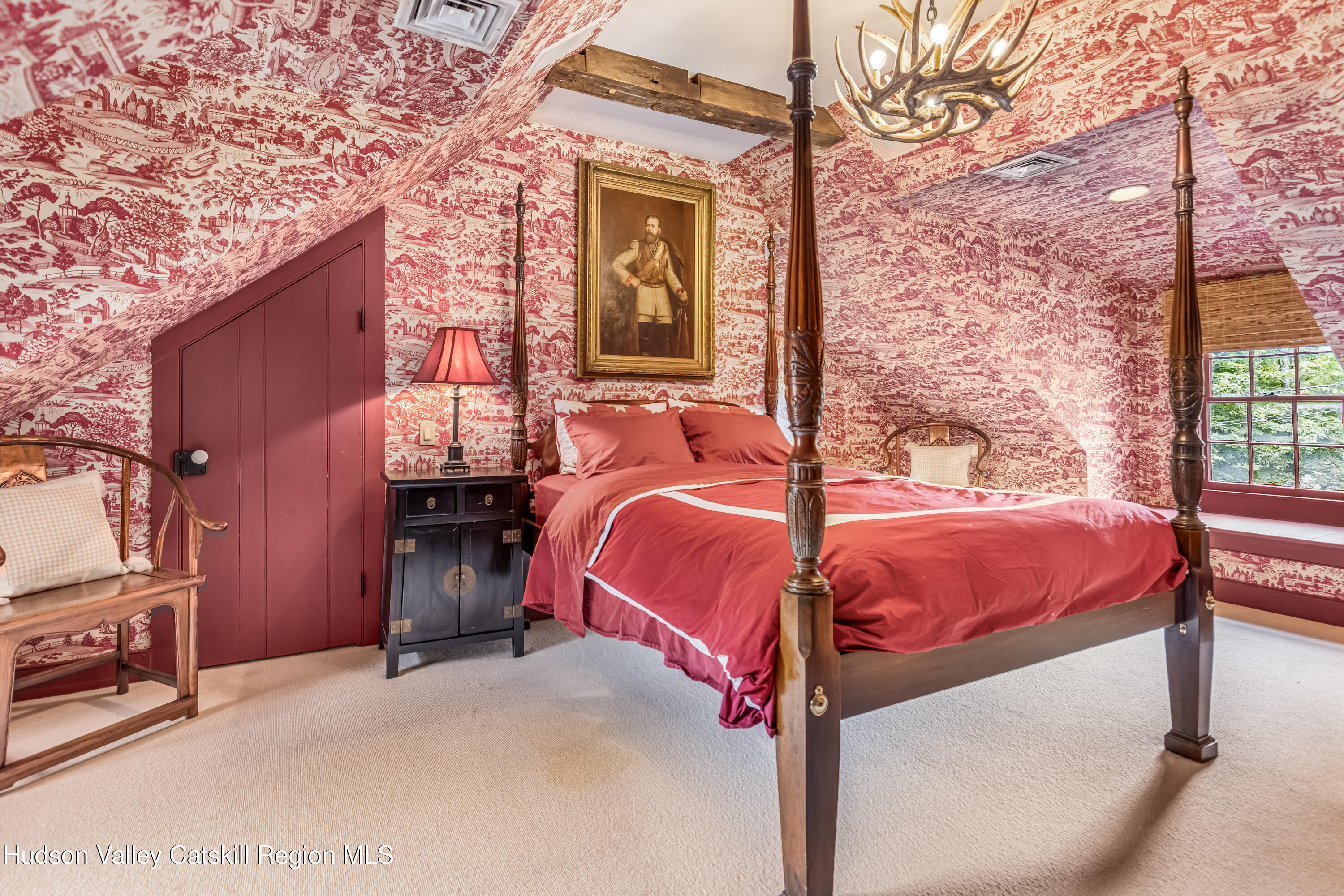 1282 Old Post Road New Paltz, NY 12561 - Photo 39 of 49 a bed room with a bed and a mirror