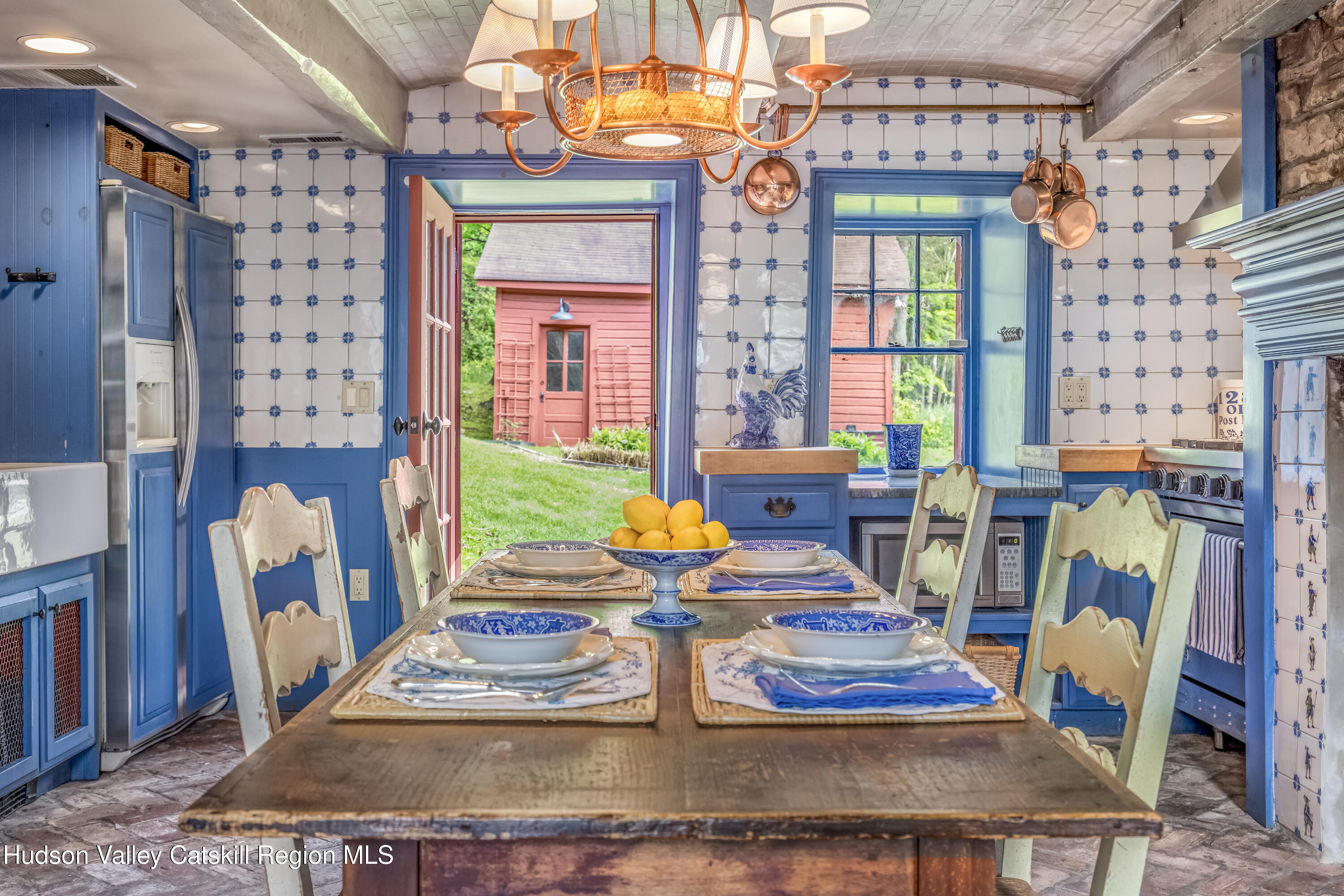 1282 Old Post Road New Paltz, NY 12561 - Photo 6 of 49 a view of a dining room with furniture a chandelier and wooden floor