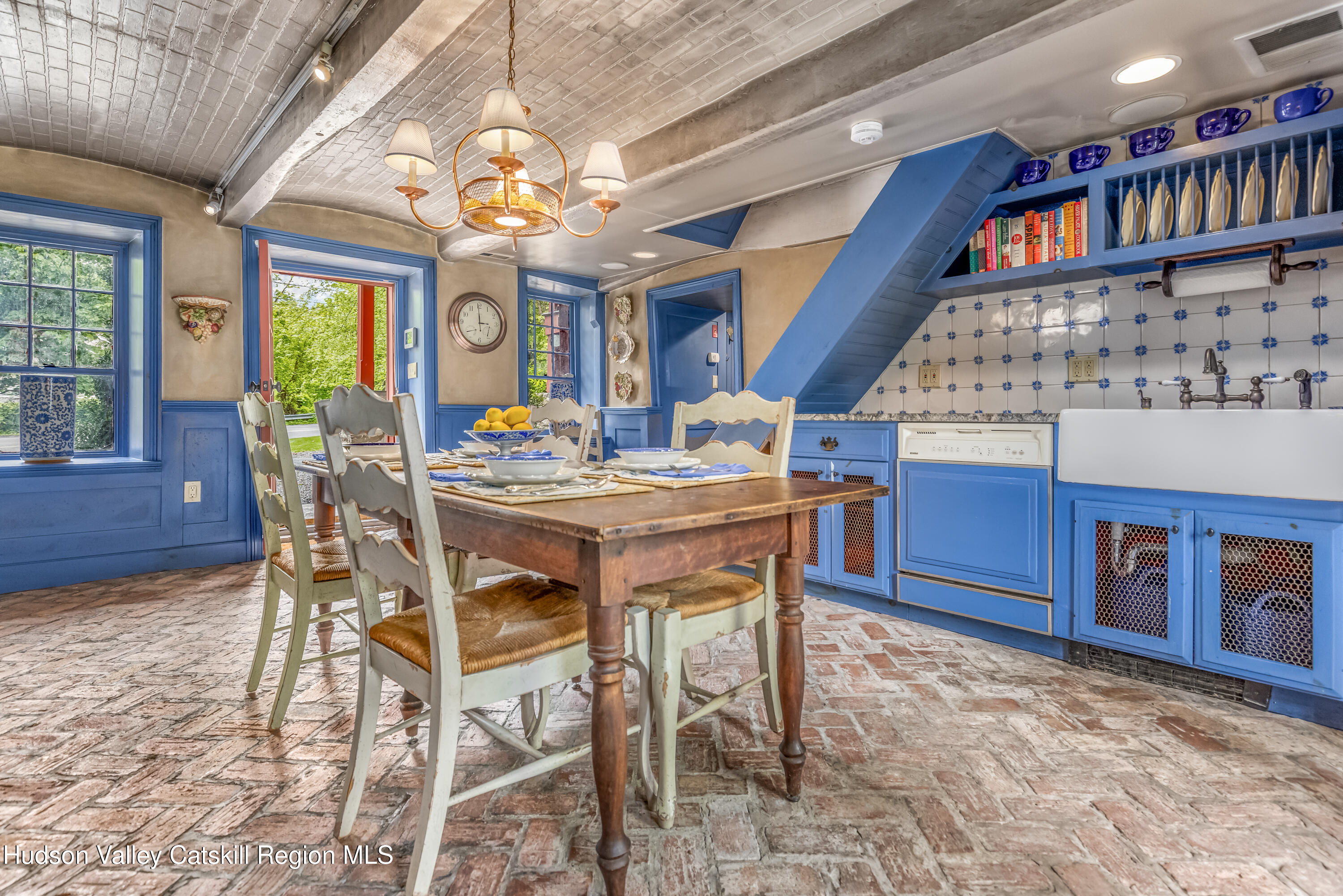 1282 Old Post Road New Paltz, NY 12561 - Photo 8 of 49 a view of a dining room with furniture chandelier and wooden floor