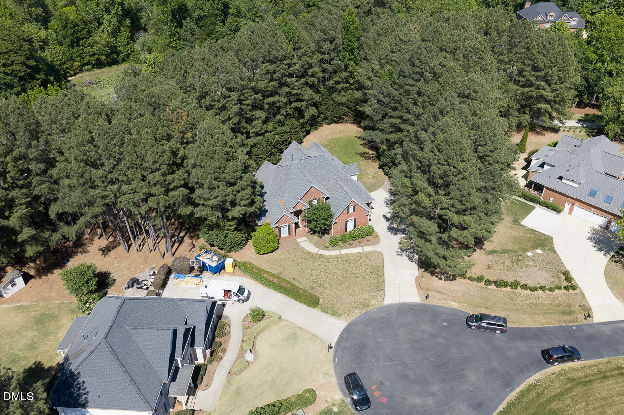 4004 Frontenac Court Apex, NC 27539 - Photo 58 of 61 an aerial view of a house with outdoor space