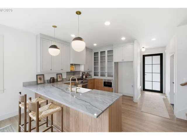 a kitchen with counter space and sink