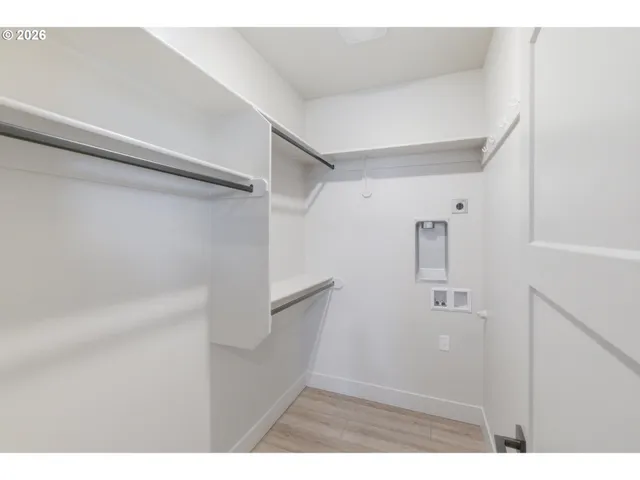 a view of small space with racks on the wall