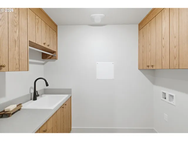 a picture of a kitchen with a sink