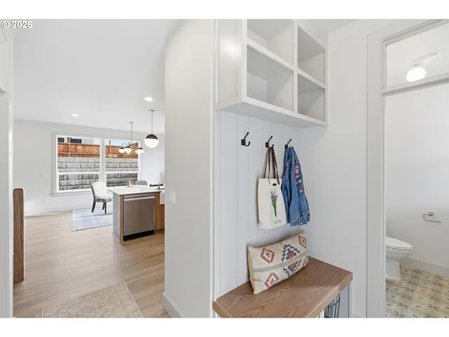 a view of kitchen with furniture and wooden floor