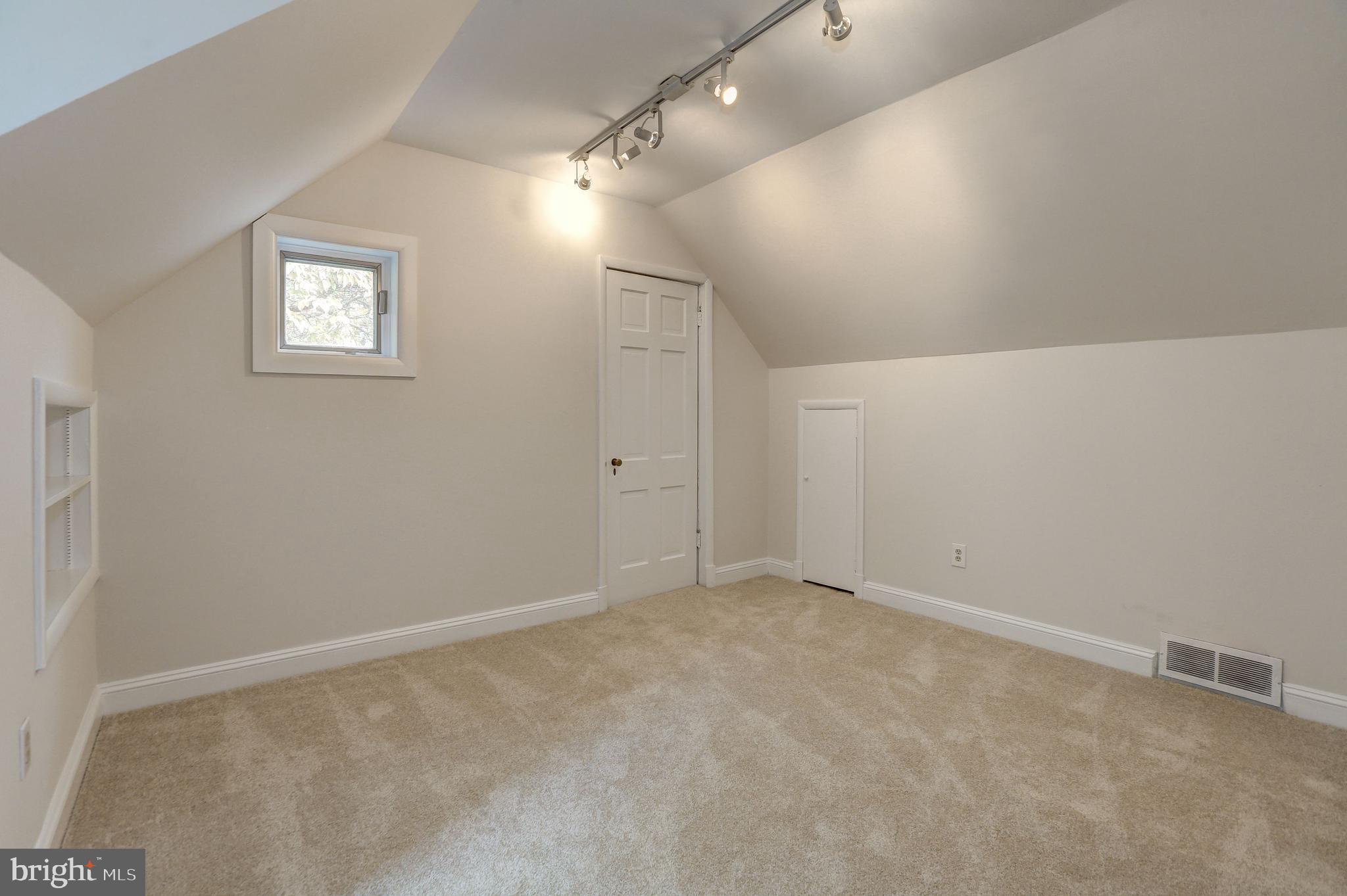 8002 Custer Road Bethesda, MD 20814 - Photo 22 of 32 Bedroom #4 w/ cathedral ceiling & access to cedar