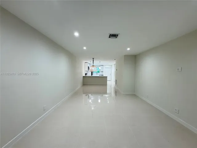 a view of kitchen and a window