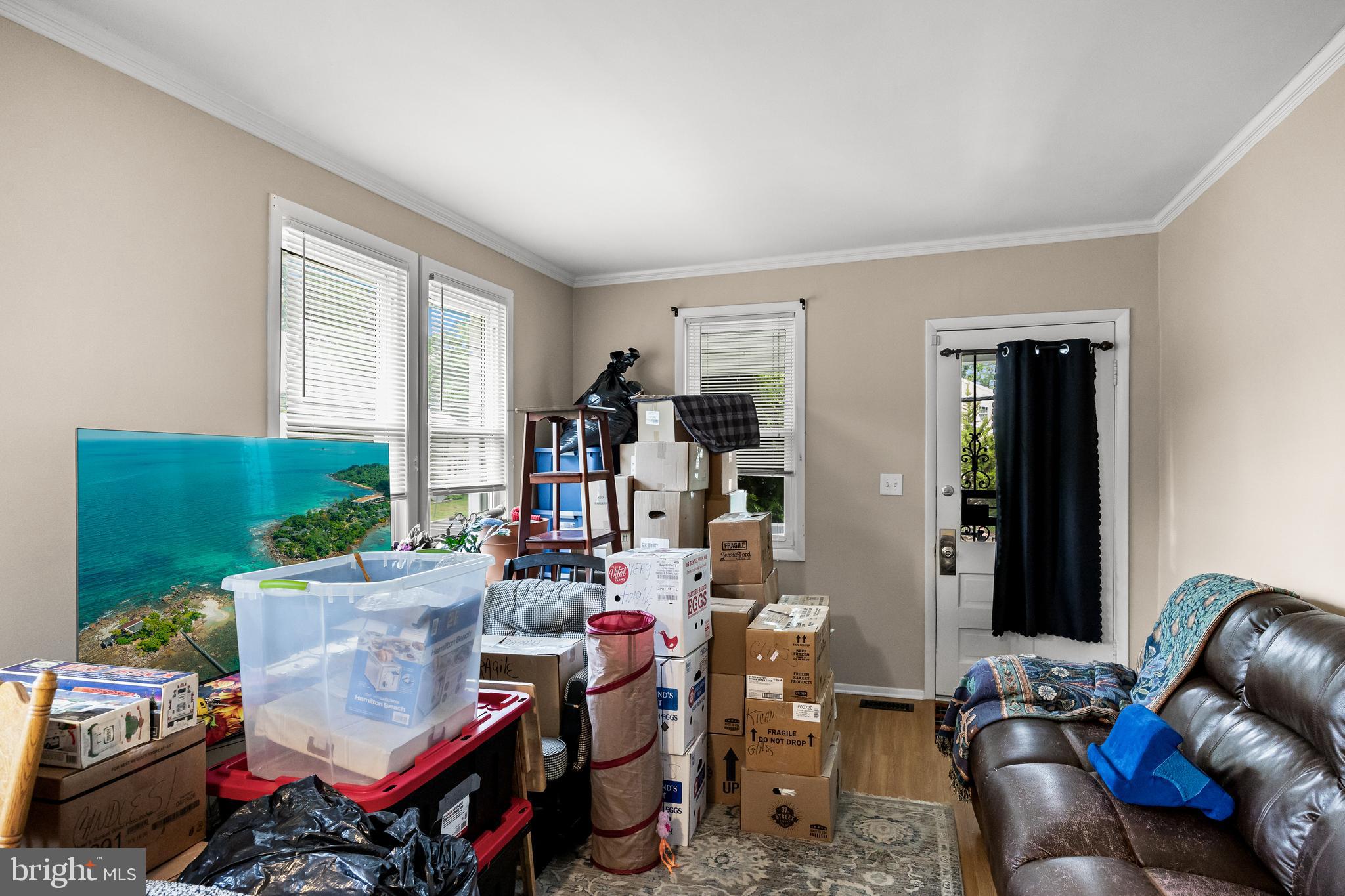 304 South Forklanding Road Maple Shade, NJ 08052 - Photo 6 of 29 a living room filled with furniture and a large window