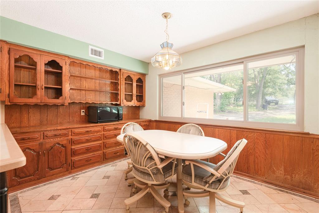 10289 County Road 578 Blue Ridge, TX 75424 - Photo 23 of 39 a view of a dining room with furniture window and outside view