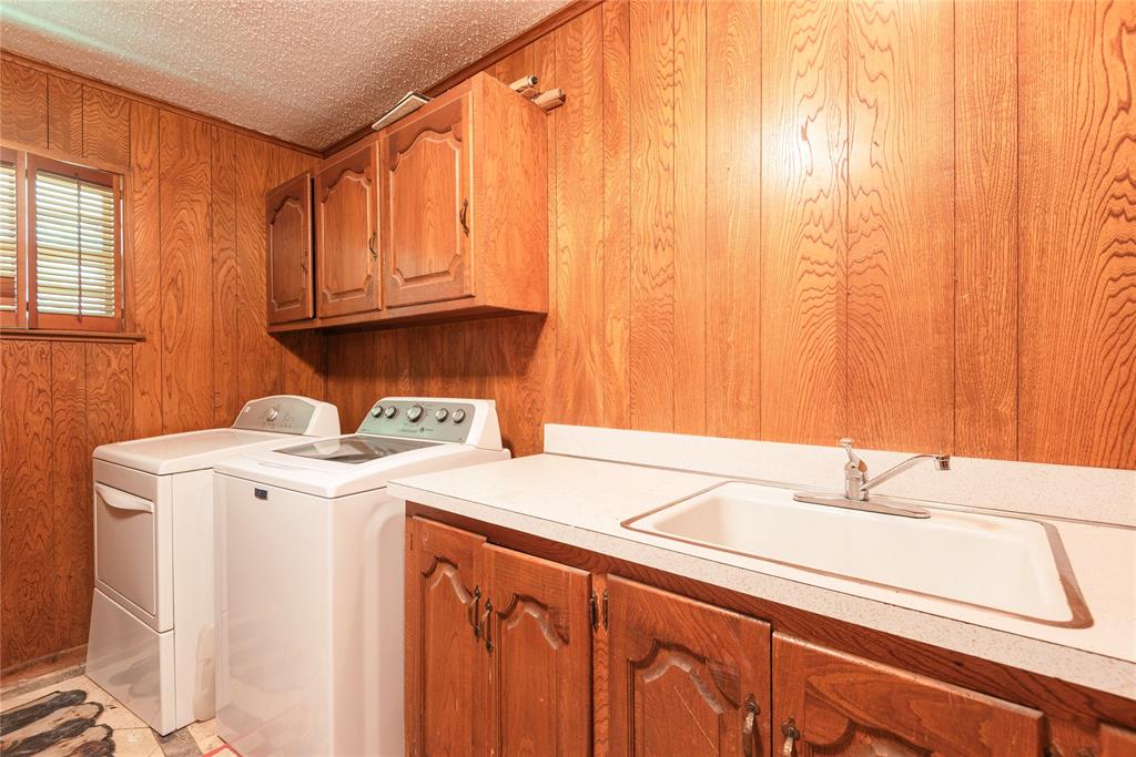 10289 County Road 578 Blue Ridge, TX 75424 - Photo 24 of 39 a utility room with dryer and washer