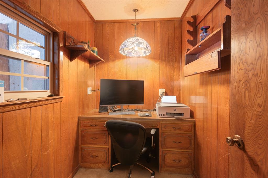 10289 County Road 578 Blue Ridge, TX 75424 - Photo 27 of 39 a view of a workspace with furniture and a window