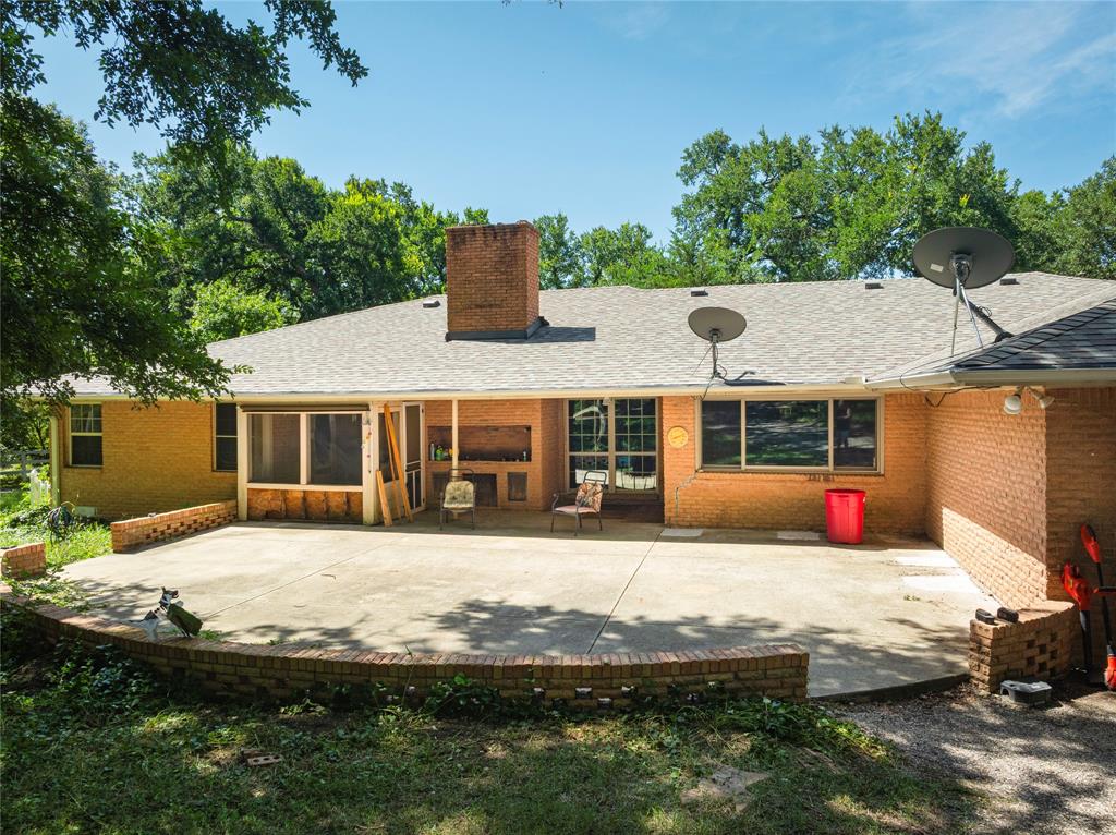 10289 County Road 578 Blue Ridge, TX 75424 - Photo 31 of 39 a front view of a house with swimming pool and patio