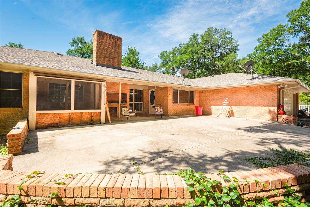 10289 County Road 578 Blue Ridge, TX 75424 - Photo 33 of 39 a view of a house with a backyard