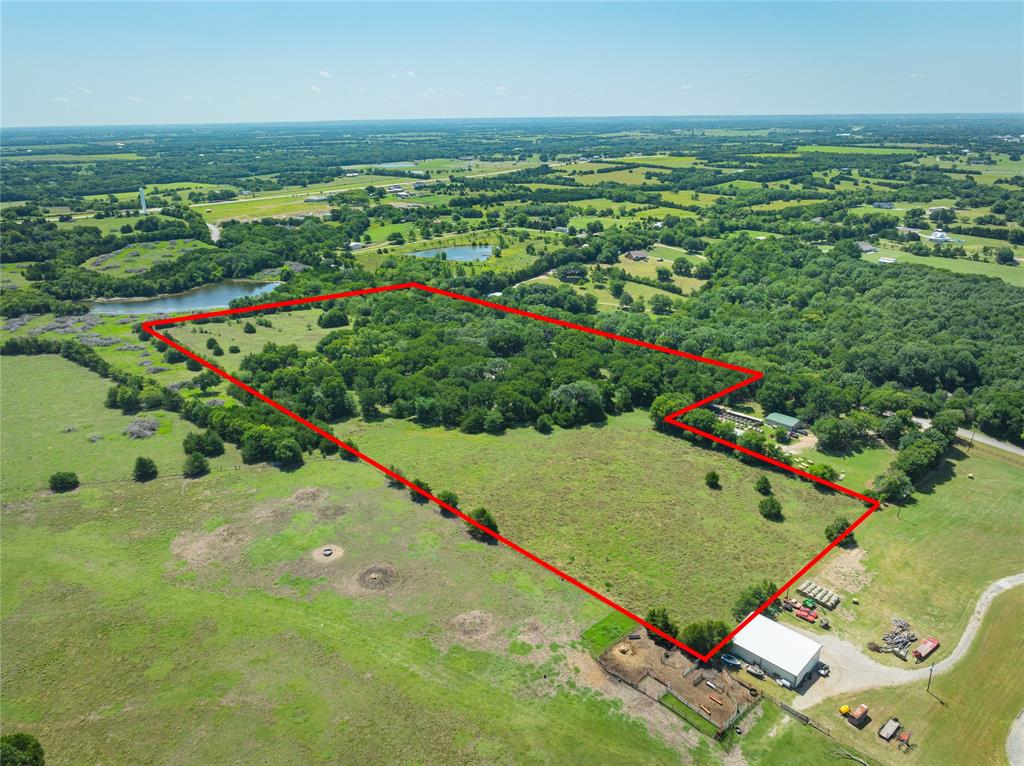 10289 County Road 578 Blue Ridge, TX 75424 - Photo 10 of 39 an aerial view of a tennis ground and a houses