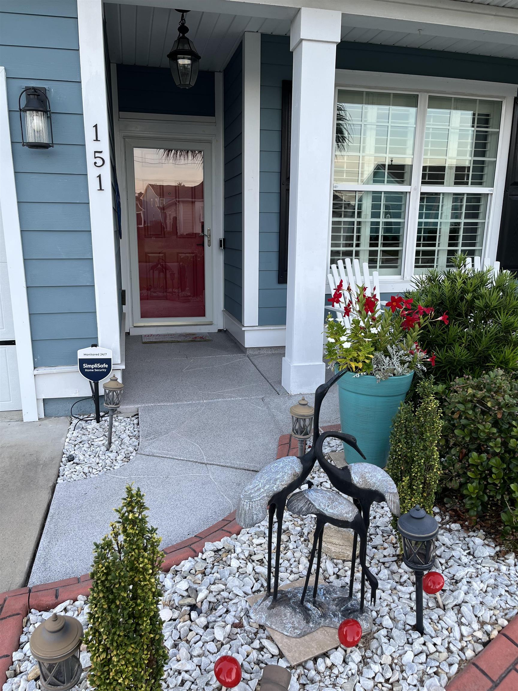 151 Coral Beach Circle Myrtle Beach, SC 29575 - Photo 4 of 40 View of exterior entry with a porch