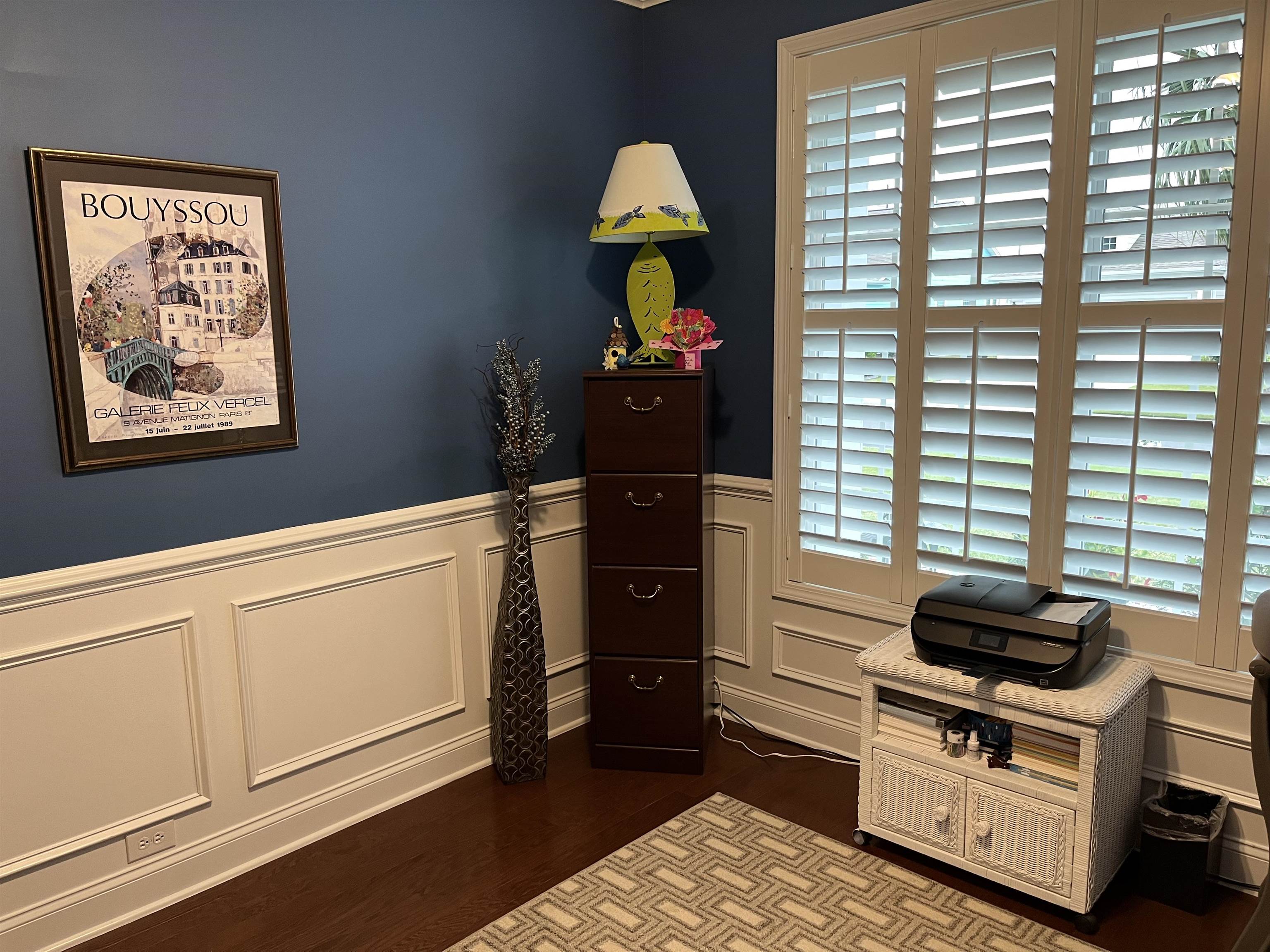 151 Coral Beach Circle Myrtle Beach, SC 29575 - Photo 6 of 40 Home office with dark wood-style floors, plenty of natural light, and a wainscoted wall