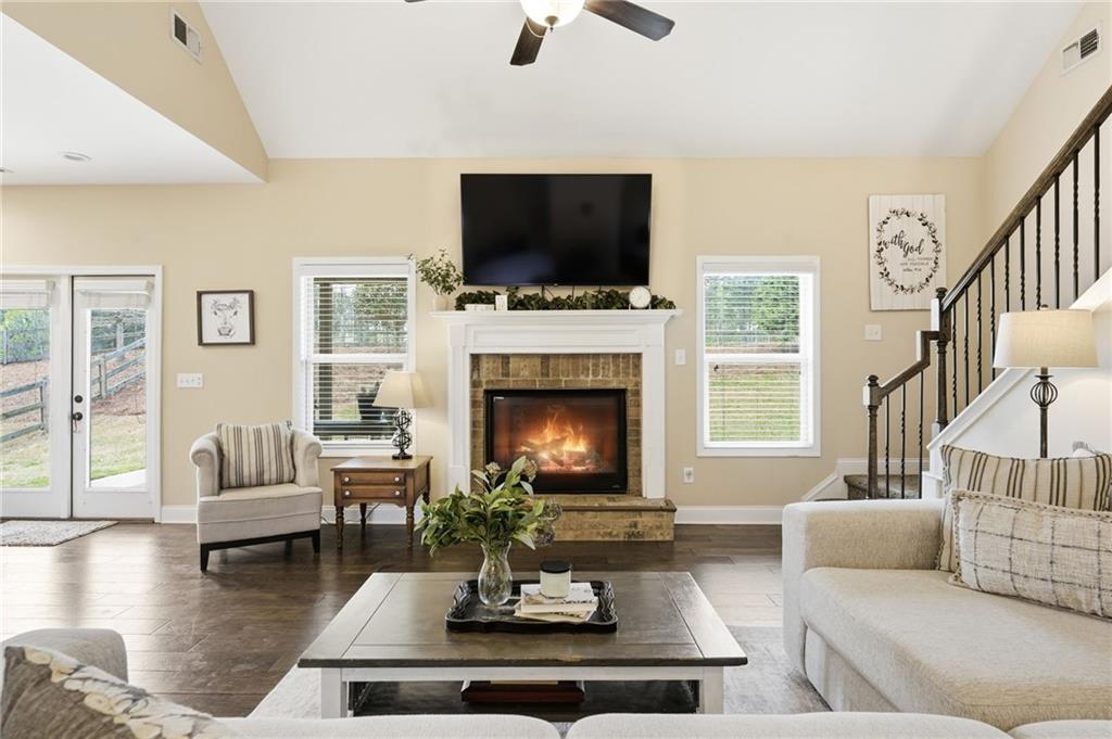 266 Cobblestone Trail Dallas, GA 30132 - Photo 13 of 49 a living room with furniture fireplace and flat screen tv