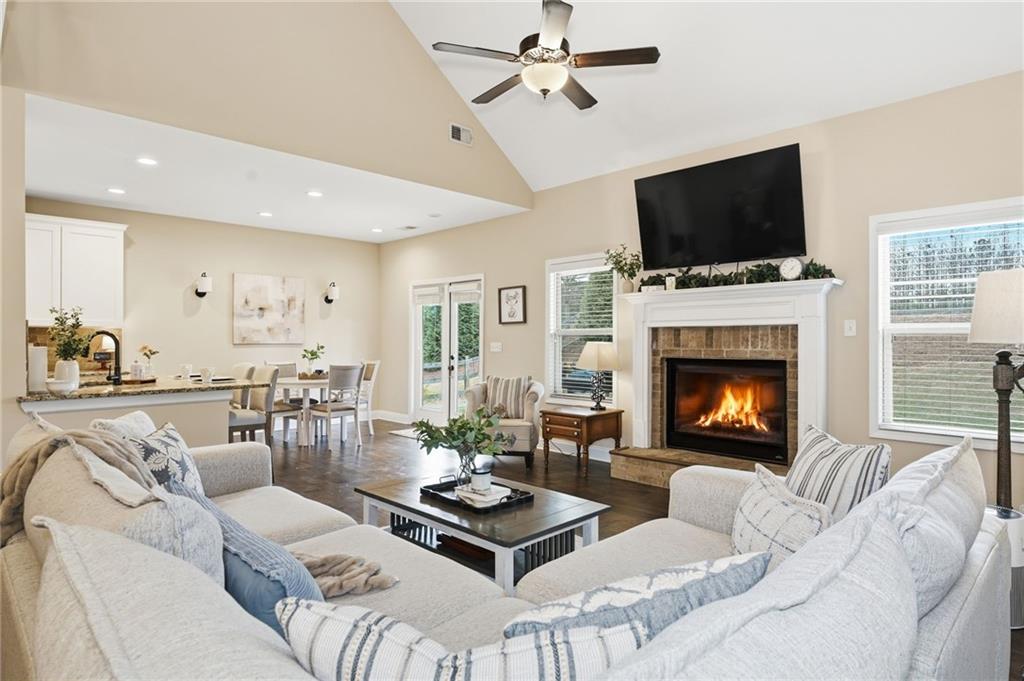 266 Cobblestone Trail Dallas, GA 30132 - Photo 14 of 49 a living room with furniture flat screen tv and a fireplace
