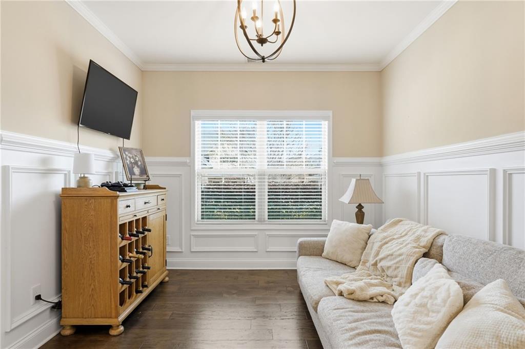 266 Cobblestone Trail Dallas, GA 30132 - Photo 18 of 49 a bedroom with bed and a flat tv screen