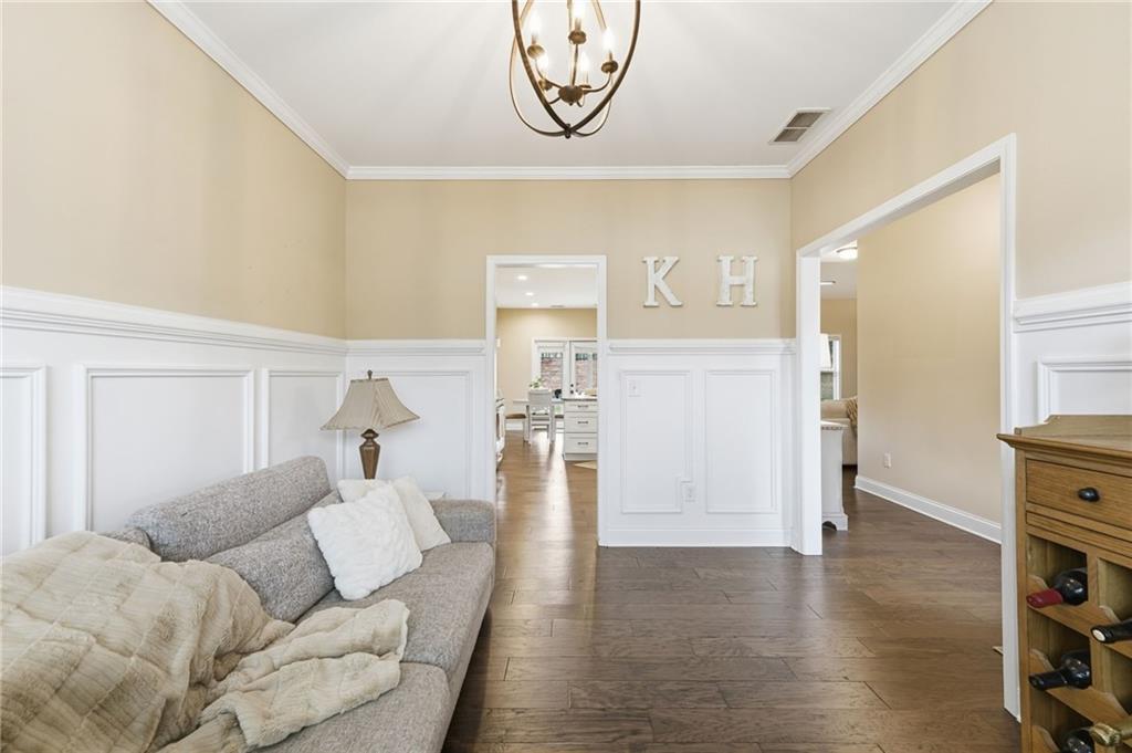 266 Cobblestone Trail Dallas, GA 30132 - Photo 19 of 49 a living room with furniture and a wooden floor